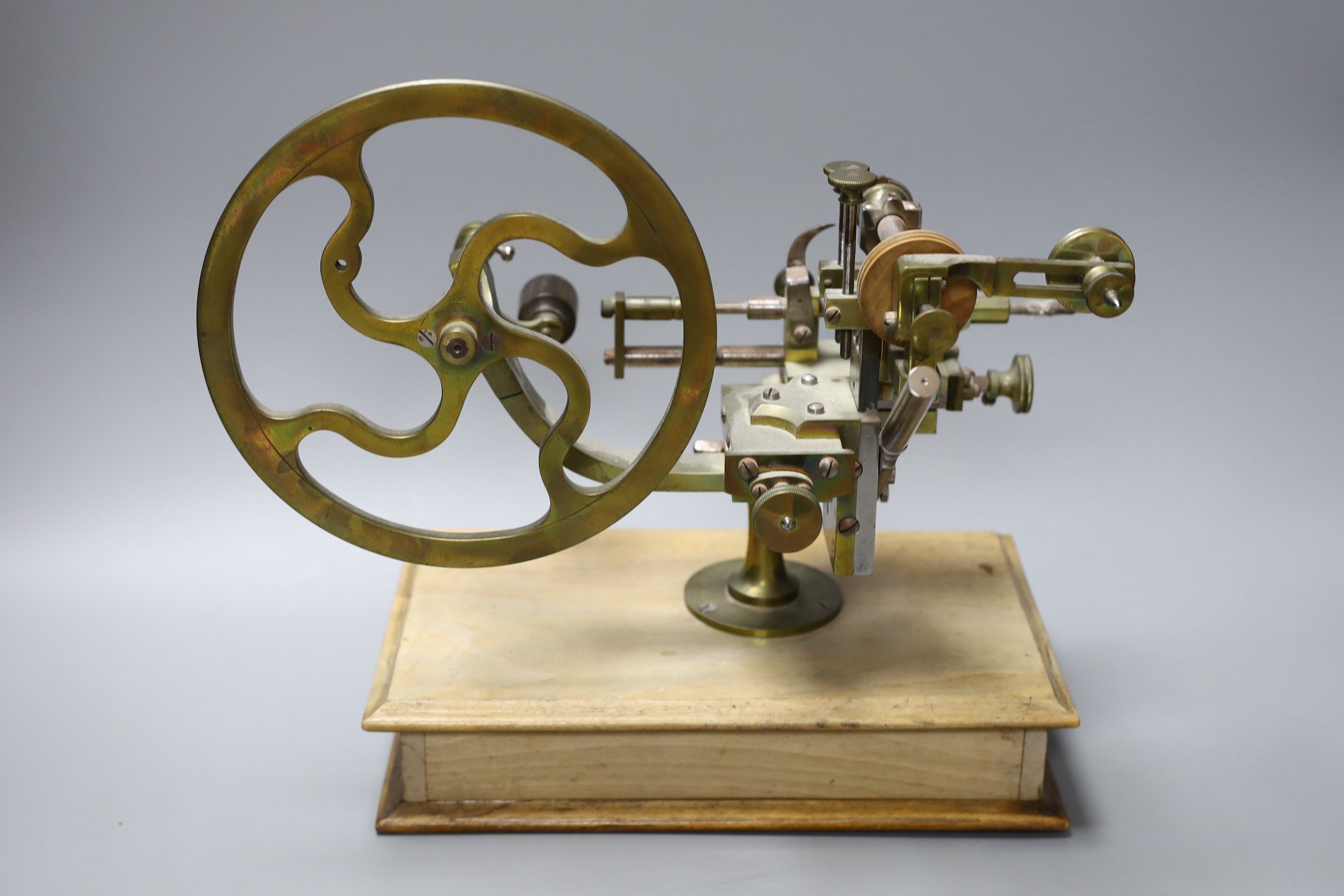 A 20th century watch makers table top lathe